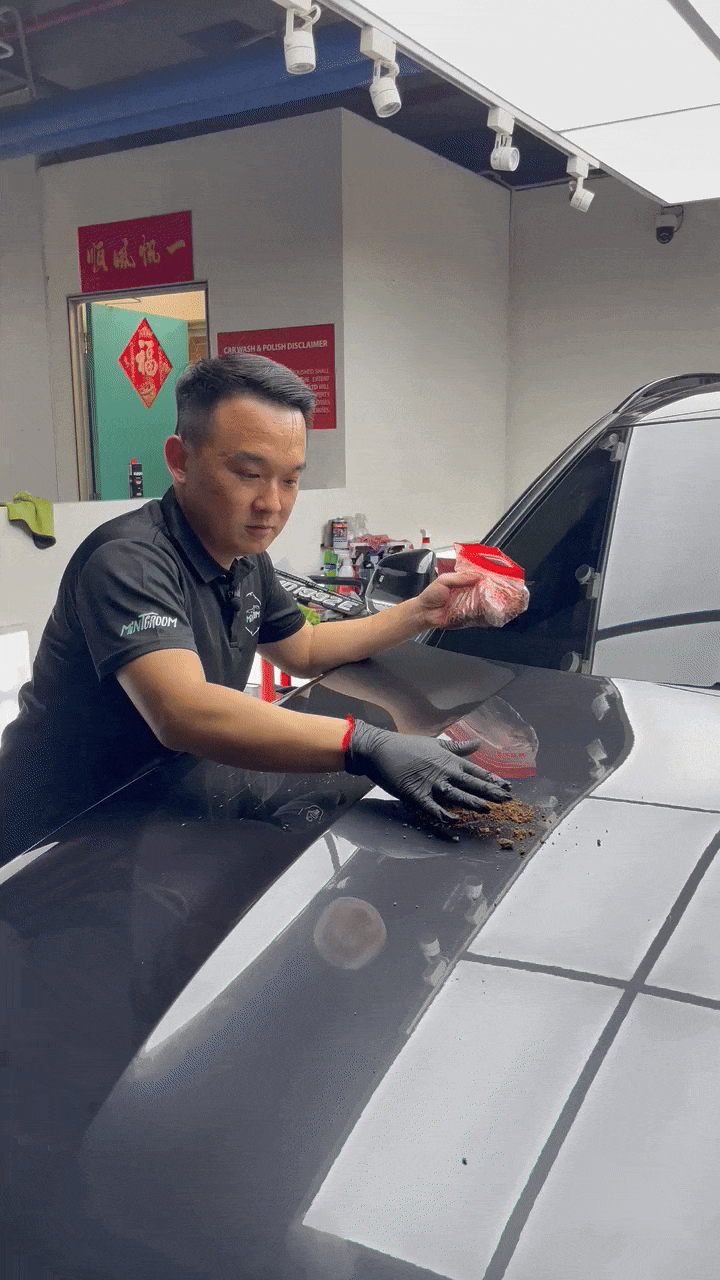 MintGroom detailer decontaminating a car bonnet before CARPRO Immortal PPF installation